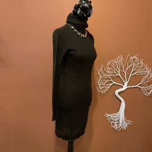 Made in Italy black wool and acrylic turtleneck dress.